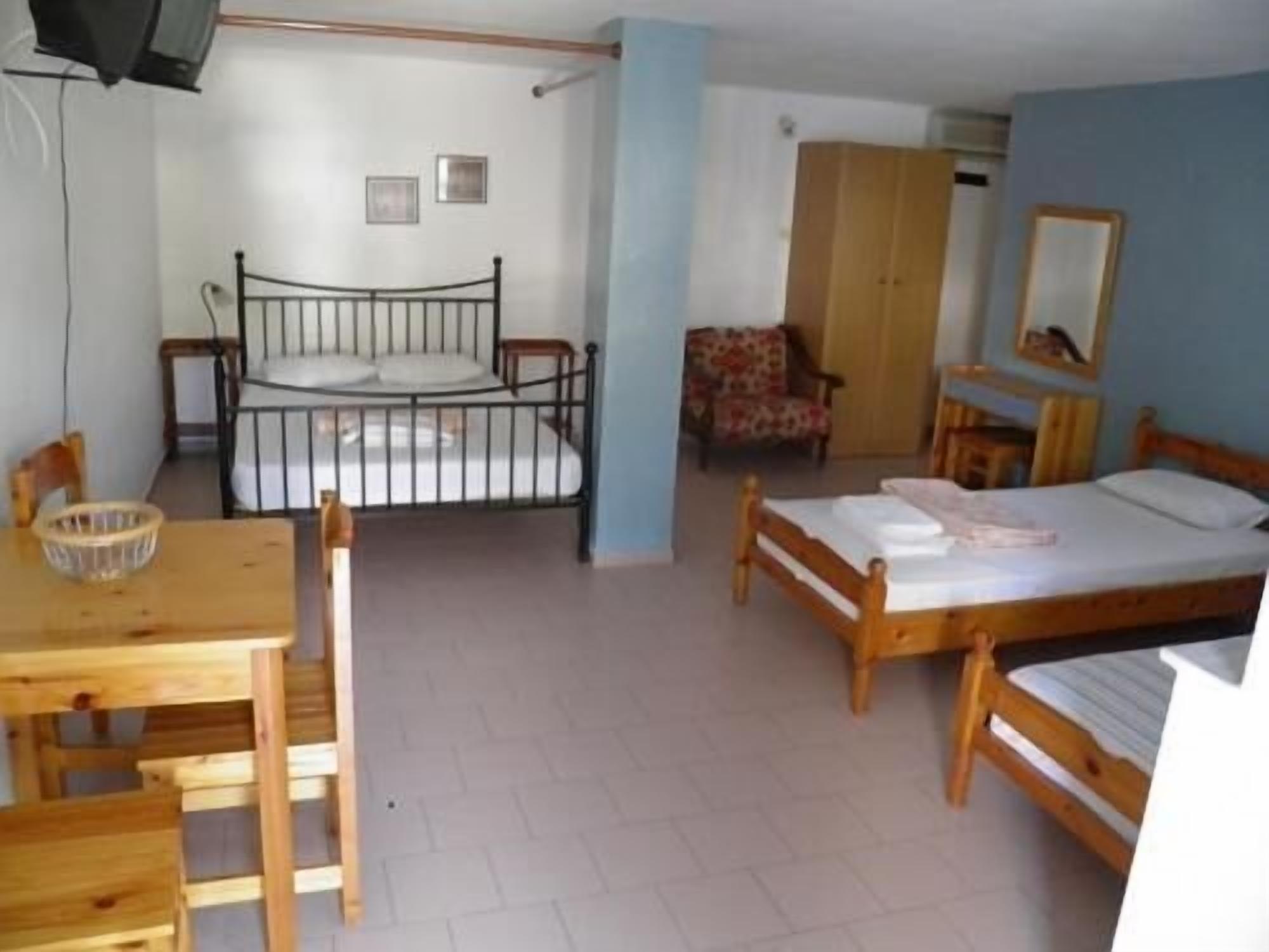 Quadruple Room, Patio, Garden View | Iron/ironing board (on request), WiFi (free)