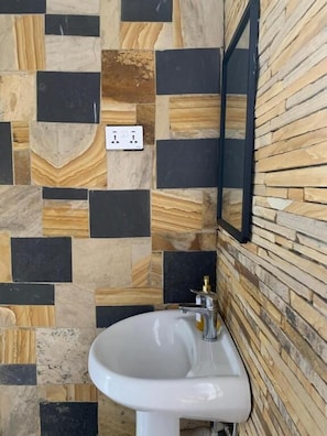Apartment, Balcony, Garden View | Bathroom | Slippers - Peakline Apartments (Arusha)