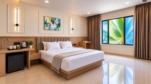 A modern hotel room with a bed, bedside tables, a coffee maker, a mini fridge, and a large window with curtains.
