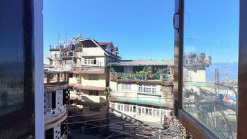 Signature Quadruple Room, City View | View from room