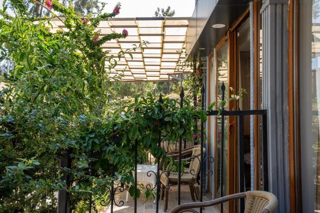 Habitación doble, vistas al jardín | Jardines del alojamiento