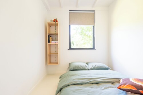 Ervaar het ultieme vakantiegevoel in deze vrij gelegen recreatiewoning met privé-wellness, houtkachel, designinterieur en airconditioning
