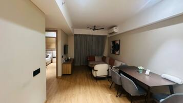 Apartment | Living area | 32-inch flat-screen TV with cable channels