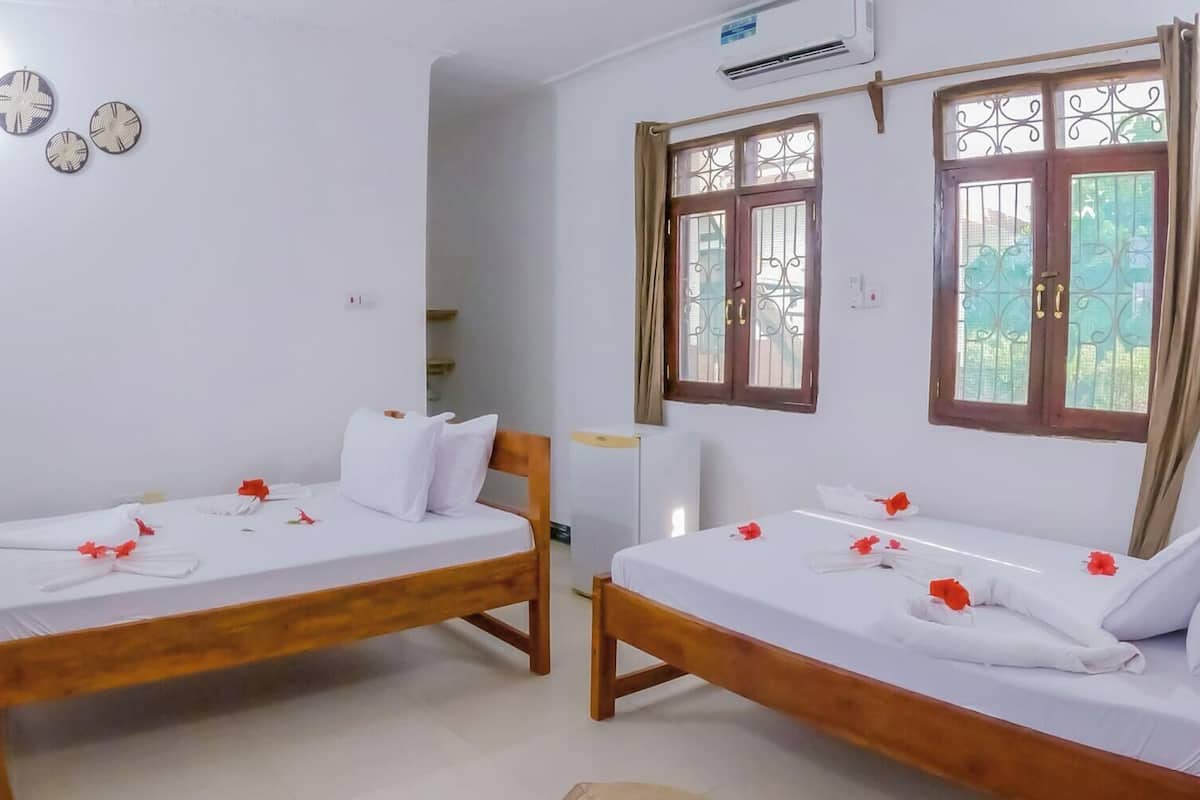 Wifi gratis, muebles diferentes y ropa de cama
