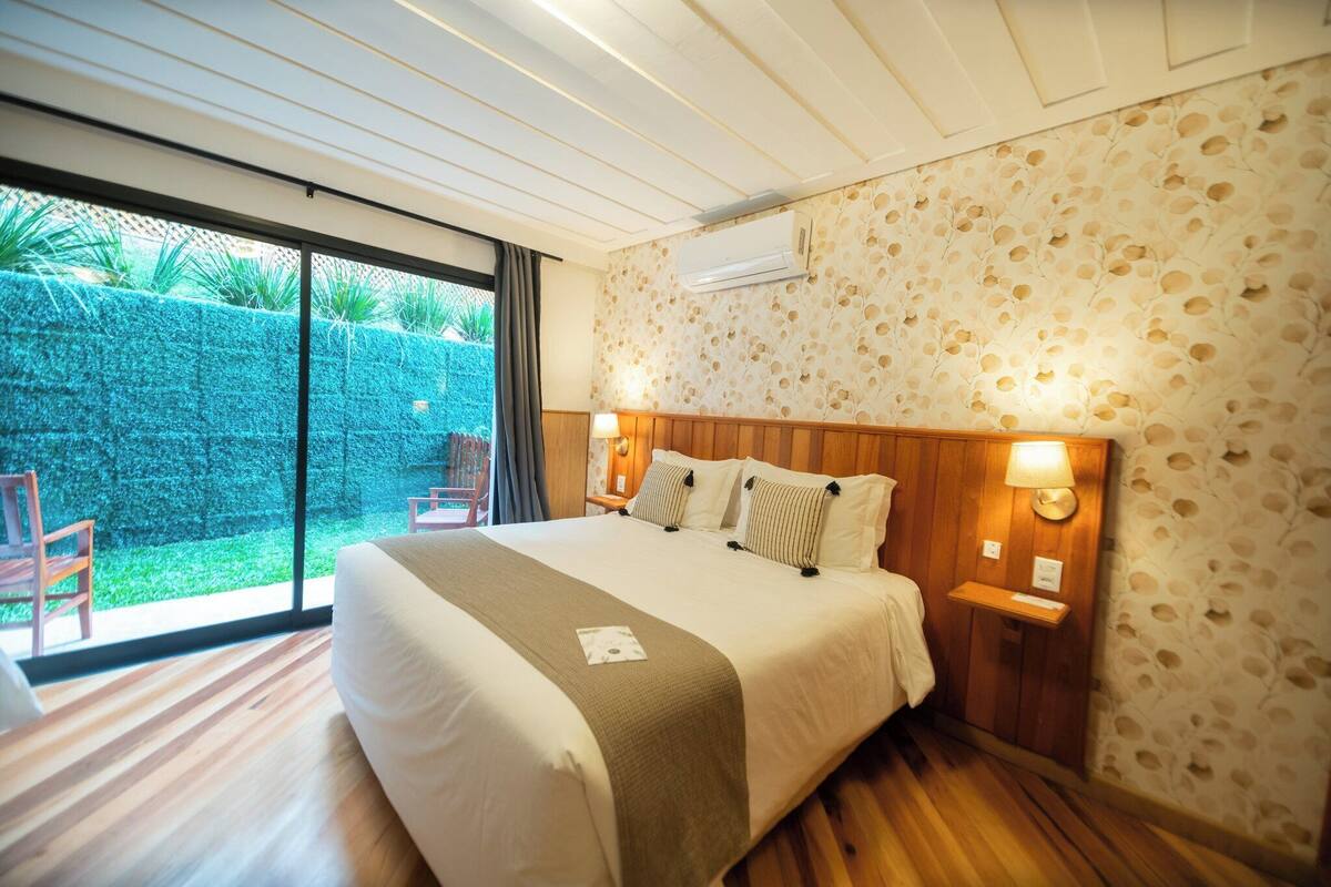 Family Room, Balcony, Garden View | Desk, iron/ironing board (on request), cribs (surcharge), WiFi (free)