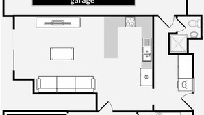 Pianta degli ambienti con soggiorno, cucina e due camere da letto. Non è indicato l'accesso al garage.