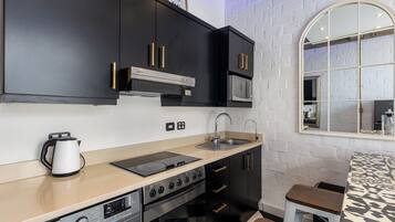 Departamento Deluxe, vista a la montaña | Cocina privada