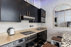 Departamento Deluxe, vista a la montaña | Cocina privada