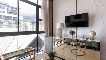 Departamento Deluxe, vista a la montaña | Área de sala de estar