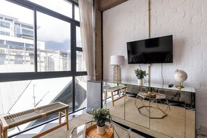 Departamento Deluxe, vista a la montaña | Área de sala de estar