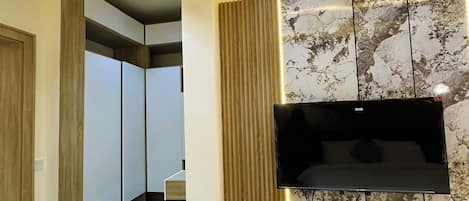Comfort Apartment, Balcony, City View | In-room safe, desk, laptop workspace, blackout drapes