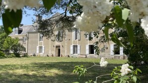 A large building with a symmetrical facade, multiple windows, and a central entrance. - Château de Saint Clair (Saint-Clair-sur-l'Elle)