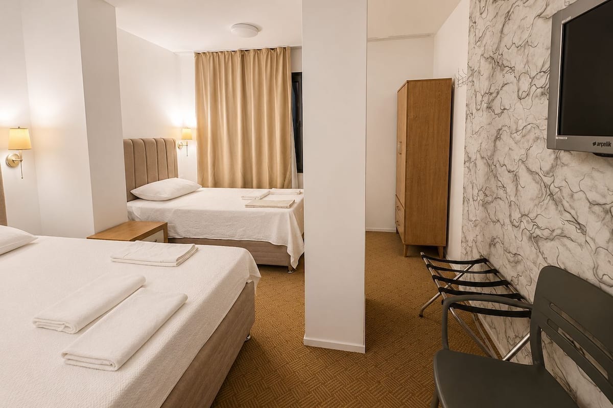 Classic Triple Room, City View