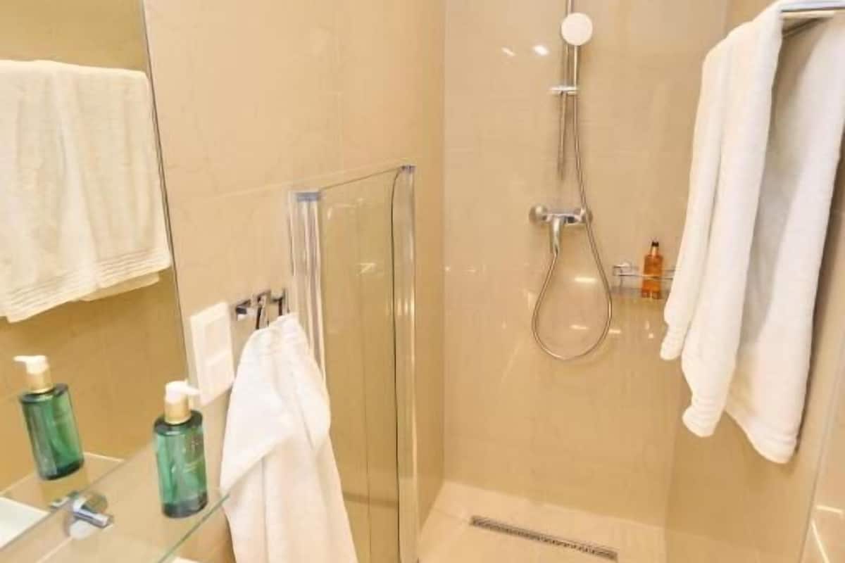 Apartamento conforto, vista para a cidade | Banheiro