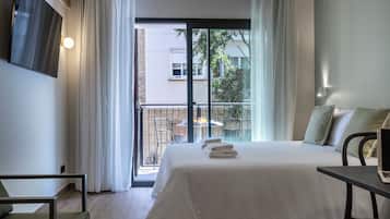 Estúdio, vista para a cidade | Roupas de cama antialérgicas, cofres nos quartos, berços grátis