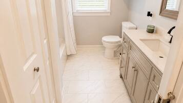 Hair dryer, towels, soap, toilet paper
