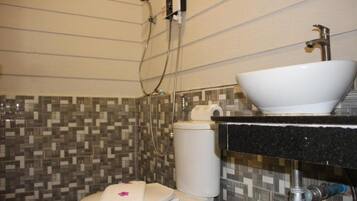 Double Room, Balcony, Garden View | Bathroom | Shower, free toiletries, hair dryer, towels