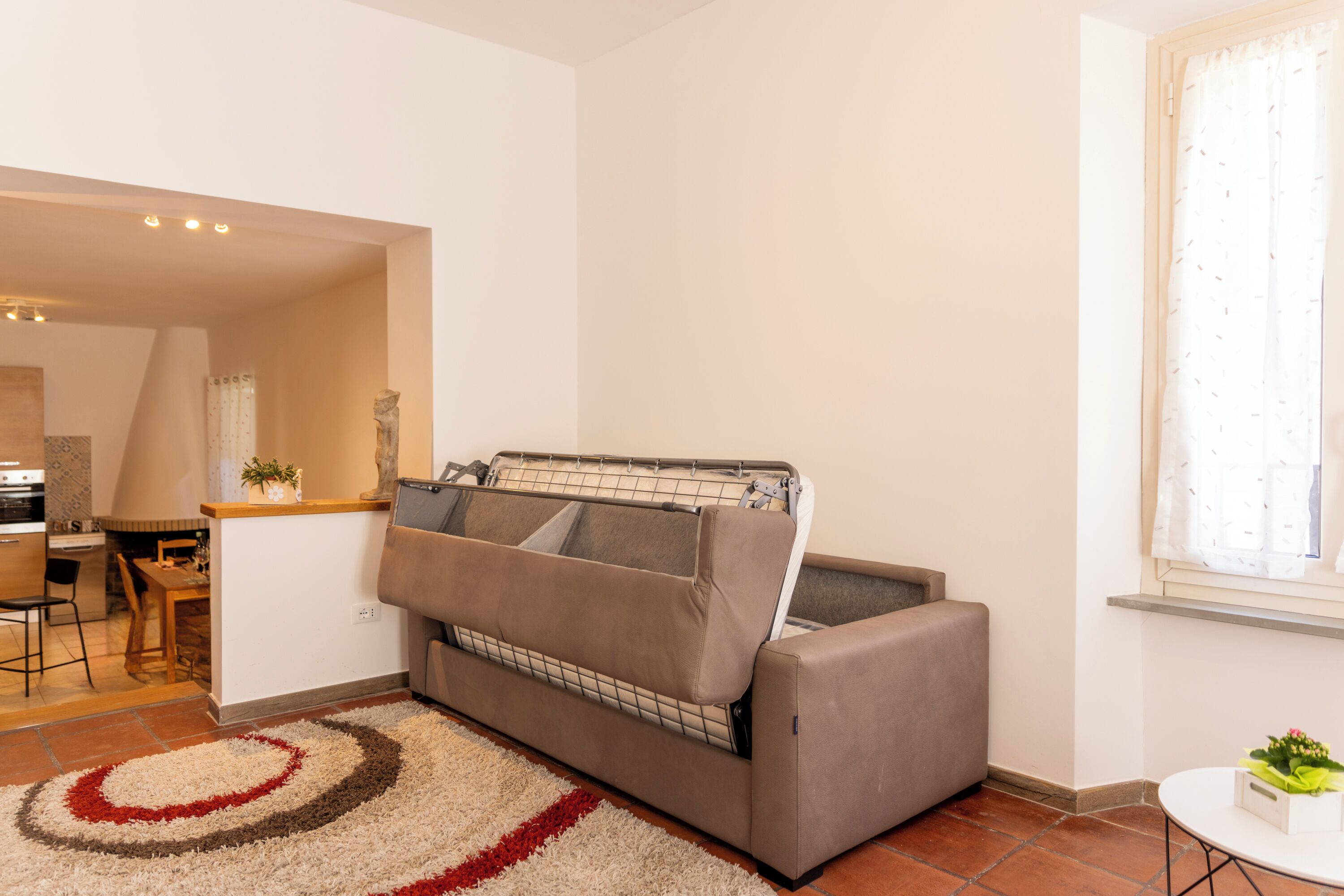 Apartment (1 Bedroom) | Living area | 32-inch Smart TV with cable channels