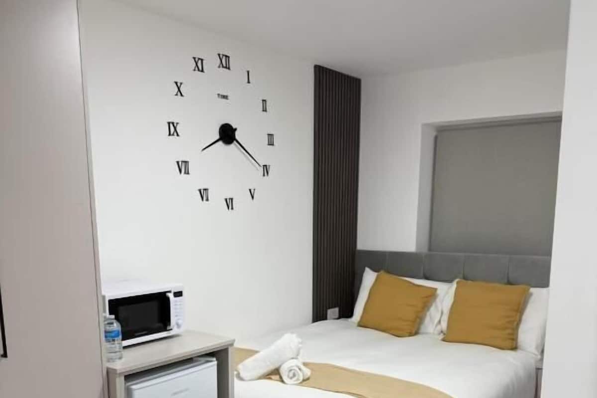 Habitación triple Deluxe, vista al jardín | Wifi gratis
