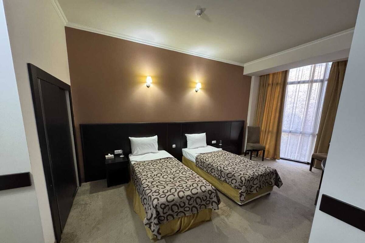 Double or Twin Room | In-room safe, iron/ironing board (on request), free WiFi