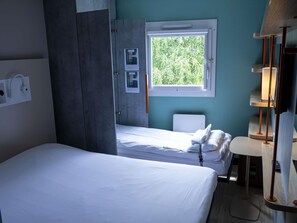 Quarto triplo, várias camas