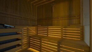 A sauna with wooden benches and slatted walls. - Wonderful 2-bedroom house with AC in charming Fethiye (fethiye)