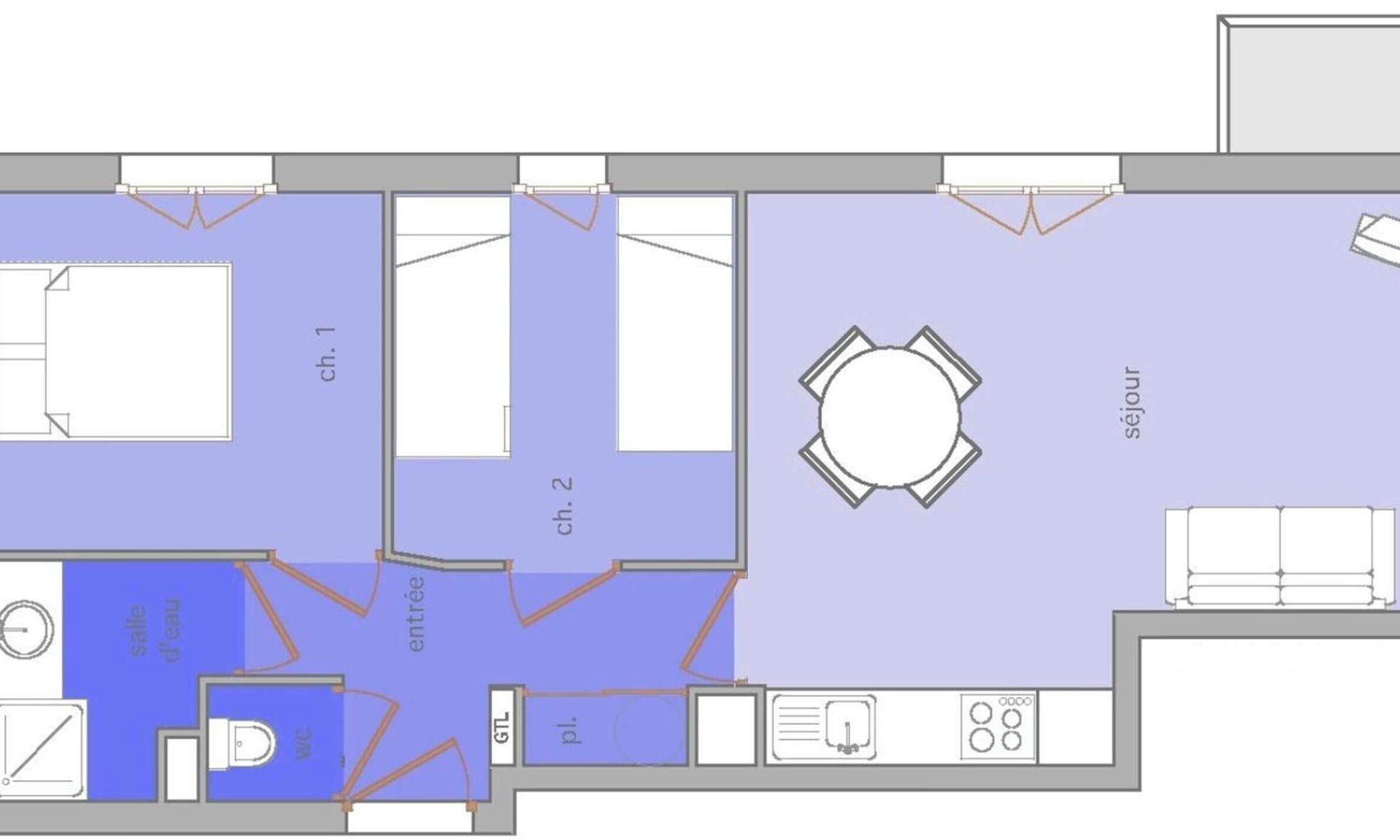 Ein Grundriss mit Wohnbereich, Essbereich, Küche, Bad und Schlafzimmer.
