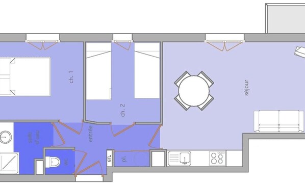 Ein Grundriss mit Wohnbereich, Essbereich, Küche, Bad und Schlafzimmer.