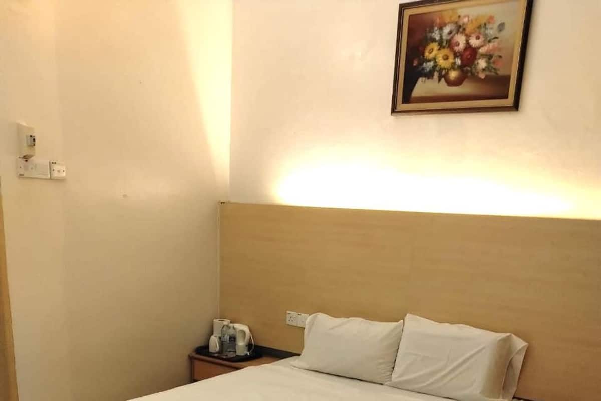 Habitación Deluxe doble | Escritorio, wifi gratis, ropa de cama