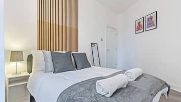 2 dormitorios, tabla de planchar con plancha, wifi y ropa de cama