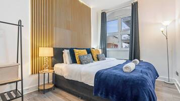 2 habitaciones, tabla de planchar con plancha, wifi y ropa de cama