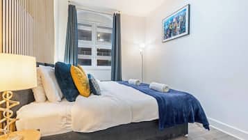 2 dormitorios, tabla de planchar con plancha, wifi y ropa de cama
