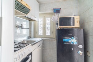 Appartamento, balcone, vista città | Cucina privata