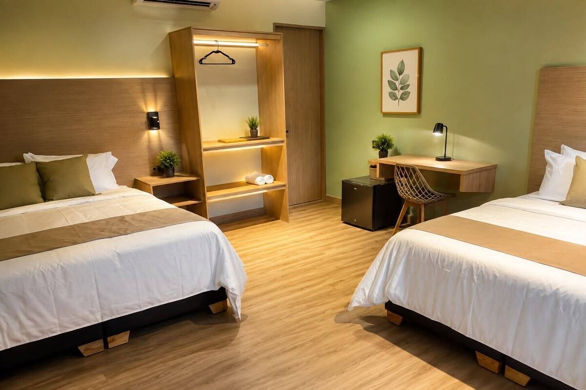 Standard Quadruple Room, Courtyard View | Down comforters, Select Comfort beds, minibar