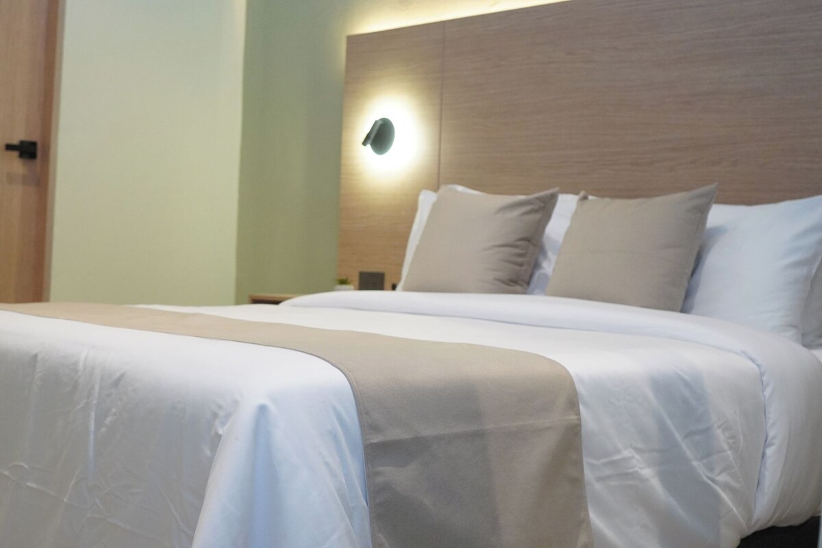Standard Quadruple Room, Courtyard View | Down comforters, Select Comfort beds, minibar
