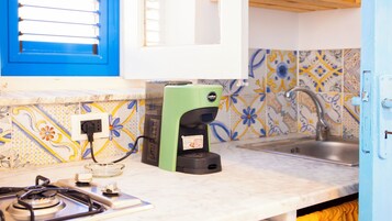 Apartment, Partial Ocean View | Private kitchen | Fridge, stovetop, cookware/dishes/utensils