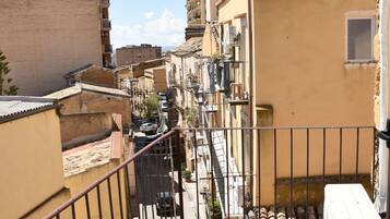 Family Room, Balcony, City View | Property grounds