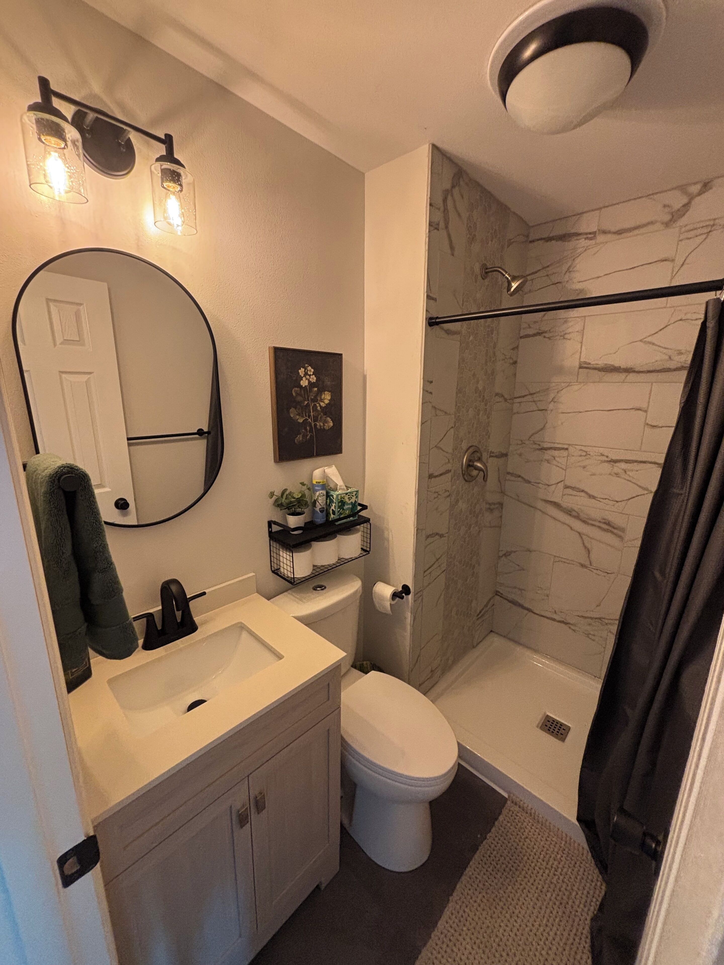 Shower, towels, soap, toilet paper