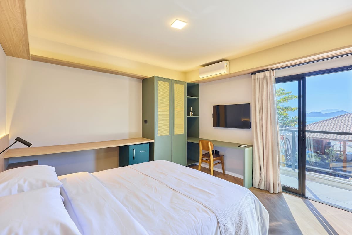 Habitación Deluxe con 2 camas individuales, vistas al mar | Cortinas opacas y wifi gratis