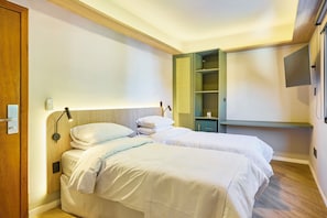 Chambre Standard avec lits jumeaux, vue cour intérieure | Rideaux occultants, Wi-Fi gratuit