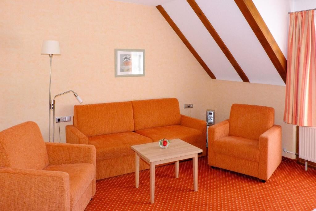 Suite, Balkon, Gartenblick | Wohnbereich