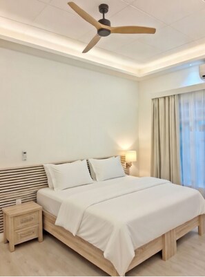 In-room safe, desk, laptop workspace, blackout drapes - Sunny Day Inn Maldives (Manadhoo)