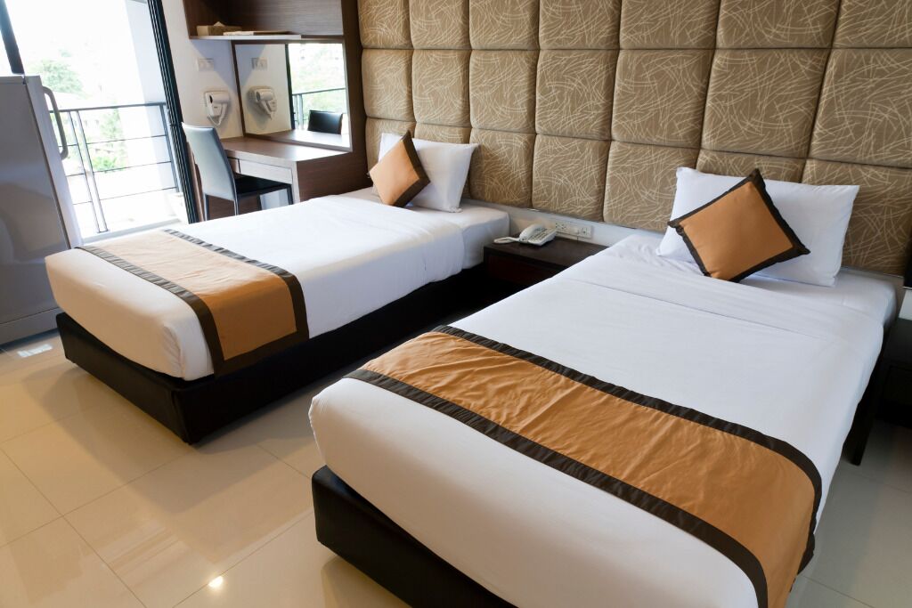 Chambre Triple Classique, climatisation, vue jardin | Bureau, Wi-Fi gratuit