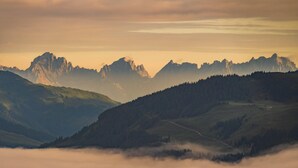 A mountainous landscape with a road winding through the valley. - Holiday With Mountain Views in Mittersill (Mittersill)