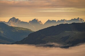 A mountainous landscape with a road winding through the valley. - Holiday With Mountain Views in Mittersill (Mittersill)