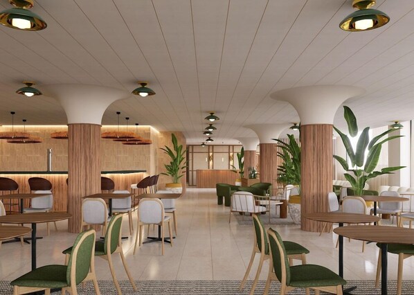 A spacious lobby with multiple seating areas, including tables and chairs, and a reception desk. - Hotel Playa Mallorca (Palma de Mallorca)