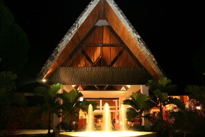 A building with a triangular roof and a water feature in front. - The Pearl Resort Spa & Golf Course (Pacific Harbour)