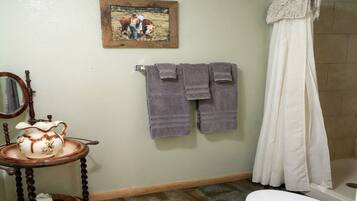 Shower, towels, soap, shampoo