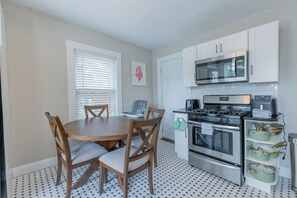 Coffee/tea maker, fridge, microwave, oven
