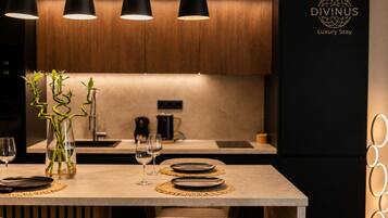 Deluxe Double Room, Balcony, City View | Private kitchen | Espresso maker, electric kettle, kitchen islands